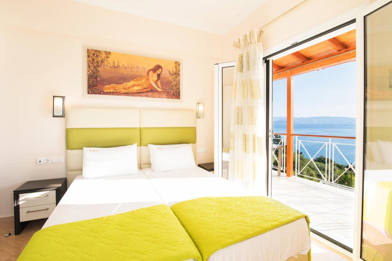 Brentanos Apartments - A - View Of Paradise Gastouri  Esterno foto