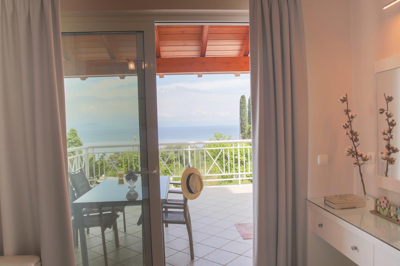 Brentanos Apartments - A - View Of Paradise Gastouri  Esterno foto